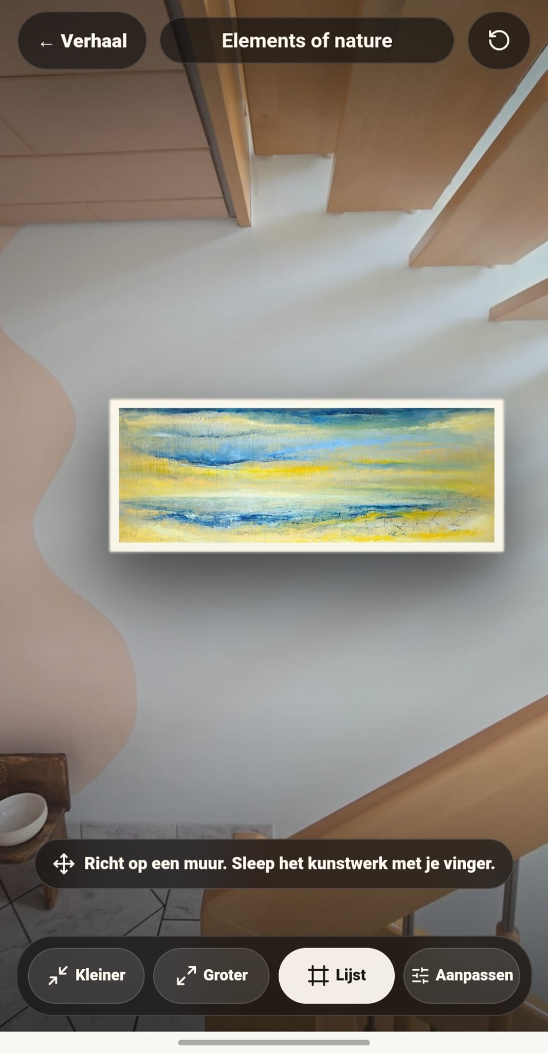 Try-at-Home voorbeeld van een schilderij aan de muur, getoond op een telefoon